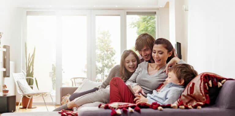Families_and_Comfort_comfort_warm_Turkish_family_taking_selfie_amily_Sofa_Indoors_Selfie_Child